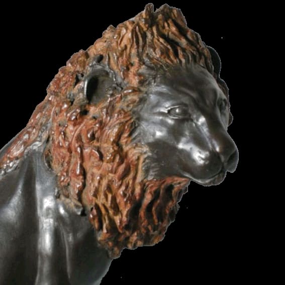 Bronzen leeuwenkop met een roodbruin gepatineerde manen